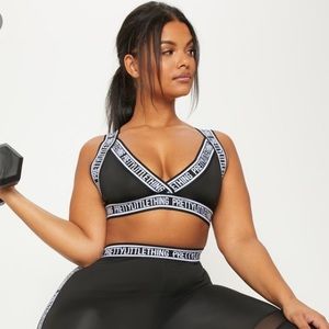 PRETTY LITTLE THING Plus Black Brand Crop Top